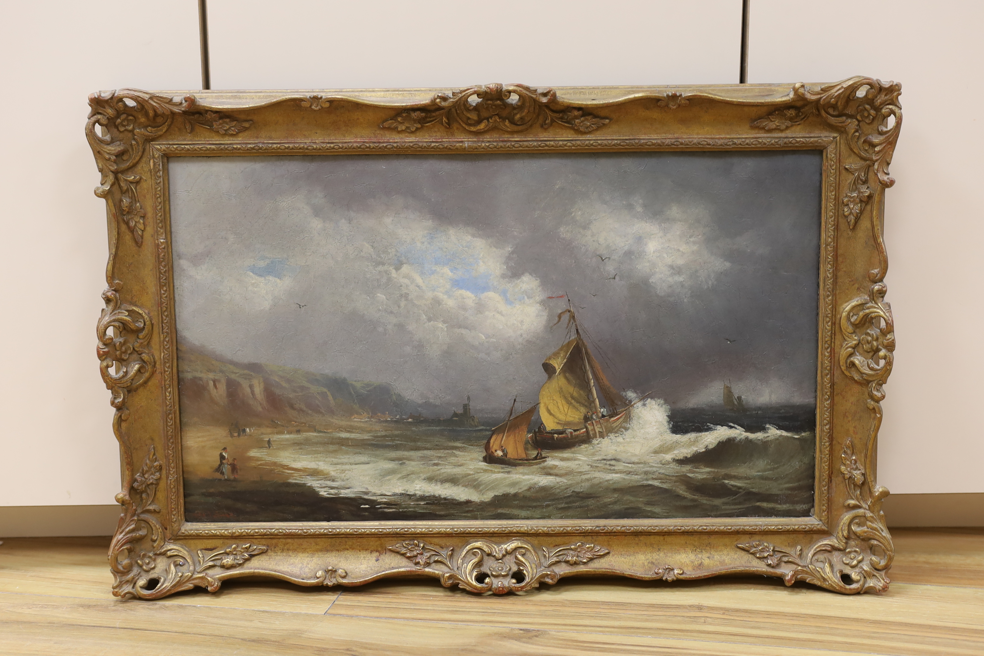 19th Century English School, oil on canvas, Fishing boats along the coast, indistinctly signed, 35 x 60cm
